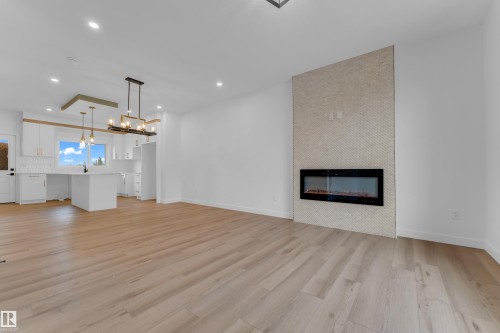 177 Graybriar Drive, Stony Plain, AB - Indoor Photo Showing Other Room With Fireplace