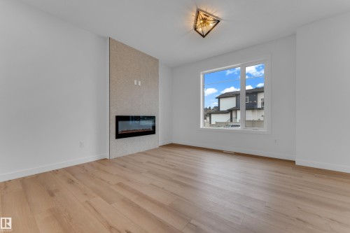 177 Graybriar Drive, Stony Plain, AB - Indoor Photo Showing Living Room With Fireplace