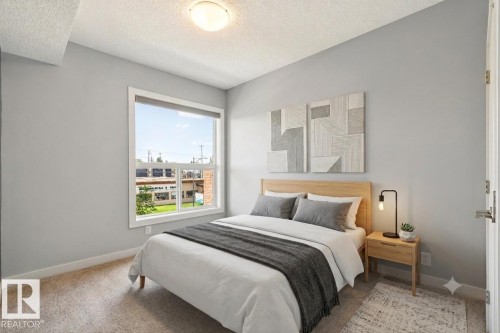 #217 10523 123 St Nw, Edmonton, AB - Indoor Photo Showing Bedroom