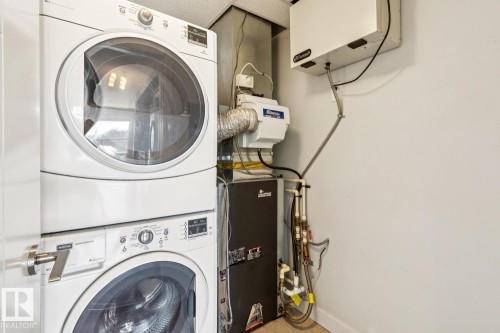 #217 10523 123 St Nw, Edmonton, AB - Indoor Photo Showing Laundry Room