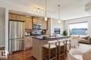 #217 10523 123 St Nw, Edmonton, AB  - Indoor Photo Showing Kitchen With Stainless Steel Kitchen 