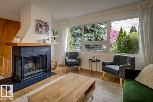 4024 121 St, Edmonton, AB - Indoor Photo Showing Living Room With Fireplace