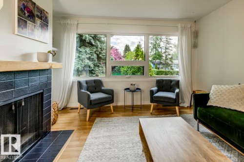 4024 121 St, Edmonton, AB - Indoor Photo Showing Living Room With Fireplace