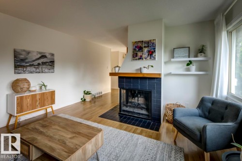 4024 121 St, Edmonton, AB - Indoor Photo Showing Living Room With Fireplace