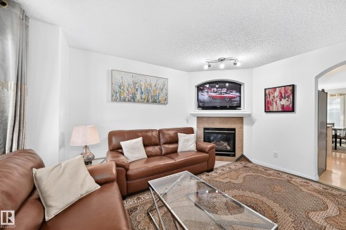 1126 Grantham Drive Nw, Edmonton, AB - Indoor Photo Showing Living Room With Fireplace
