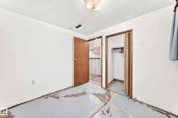 White walls with an exposed concrete floor - 
