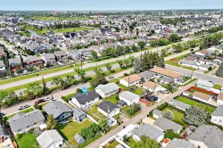 Expansive residential area featuring a variety of housing styles and established tree-lined streets - 