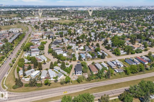 Aerial perspective of a residential community featuring extensive tree coverage and established streets - 219 Lee Ridge Road, Edmonton, AB - Outdoor With View
