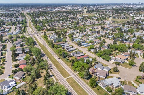 Aerial perspective showcasing a residential area with extensive tree coverage - 219 Lee Ridge Road, Edmonton, AB - Outdoor With View