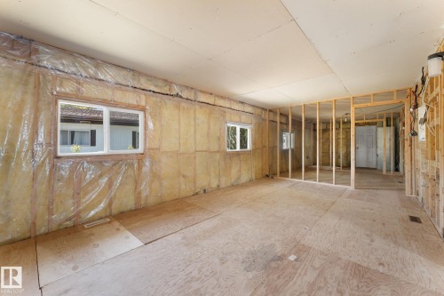 Interior framing and insulation with exposed subflooring throughout - 219 Lee Ridge Road, Edmonton, AB - Indoor Photo Showing Other Room