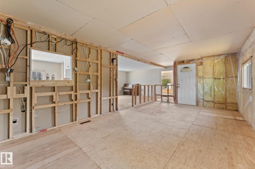 Framed interior space with exposed electrical wiring and drywall, offering a blank canvas for customization - 219 Lee Ridge Road, Edmonton, AB - Indoor Photo Showing Other Room