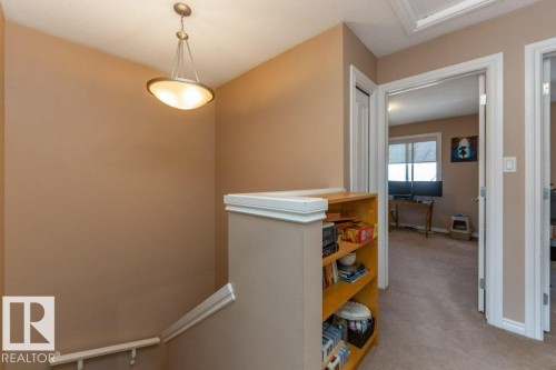 #134 5420 Grant Macewan Bv, Leduc, AB - Indoor Photo Showing Other Room