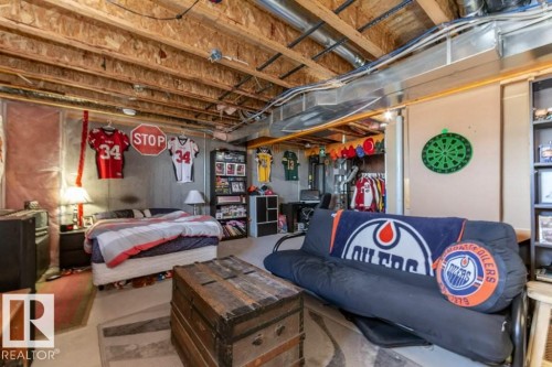 #134 5420 Grant Macewan Bv, Leduc, AB - Indoor Photo Showing Basement