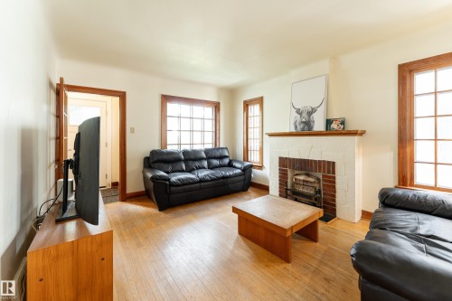 11108 81 Avenue Nw, Edmonton, AB - Indoor Photo Showing Living Room With Fireplace