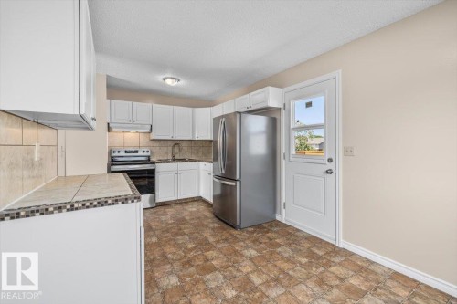 5212 50 Avenue, Bruderheim, AB - Indoor Photo Showing Kitchen With Stainless Steel Kitchen