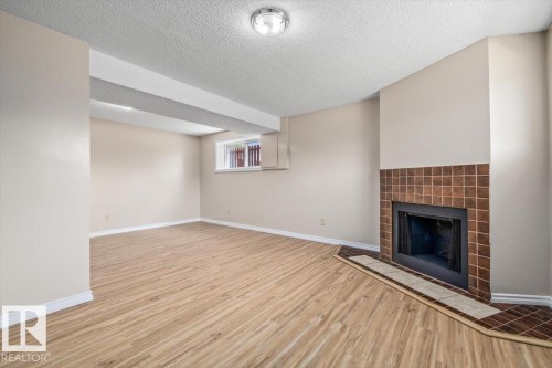 5212 50 Avenue, Bruderheim, AB - Indoor With Fireplace