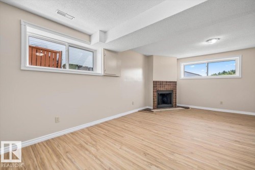 5212 50 Avenue, Bruderheim, AB - Indoor With Fireplace