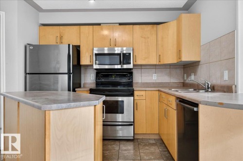 #503 10033 116 St Nw, Edmonton, AB - Indoor Photo Showing Kitchen With Stainless Steel Kitchen With Double Sink