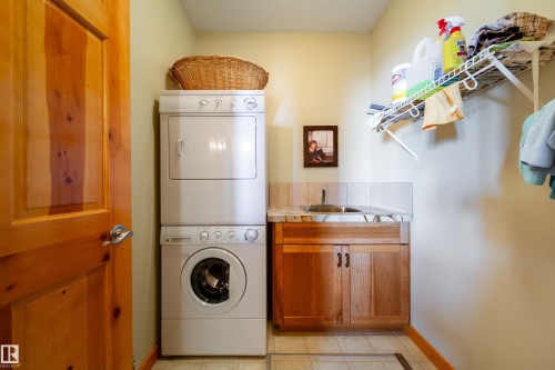 103 Argentia Beach, Rural Wetaskiwin County, AB - Indoor Photo Showing Laundry Room