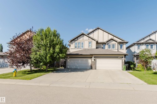 Contemporary two-story residence featuring a dual garage and a neutral exterior color palette - 17348 6 Avenue Nw, Edmonton, AB - Outdoor With Facade