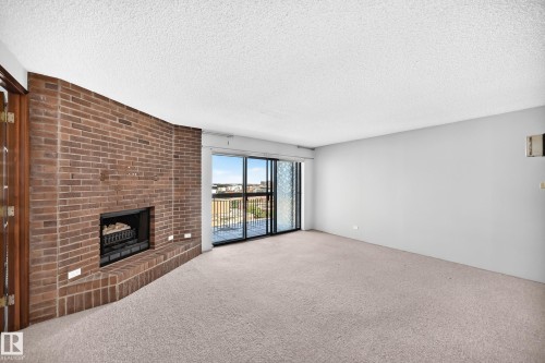 #1802 11027 87 Av Nw, Edmonton, AB - Indoor With Fireplace