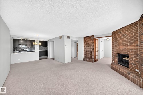#1802 11027 87 Av Nw, Edmonton, AB - Indoor With Fireplace