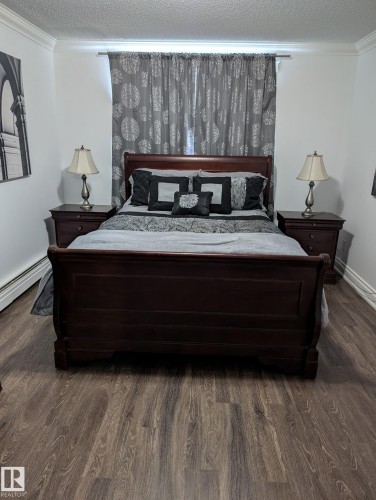 #101 10745 83 Av Nw, Edmonton, AB - Indoor Photo Showing Bedroom