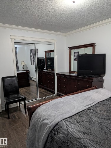 #101 10745 83 Av Nw, Edmonton, AB - Indoor Photo Showing Bedroom