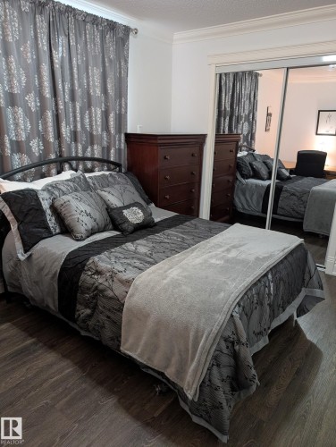 #101 10745 83 Av Nw, Edmonton, AB - Indoor Photo Showing Bedroom
