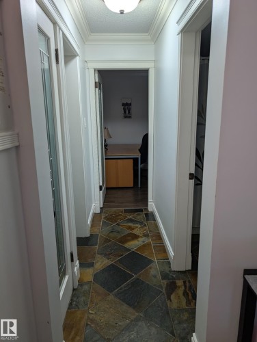 #101 10745 83 Av Nw, Edmonton, AB - Indoor Photo Showing Other Room