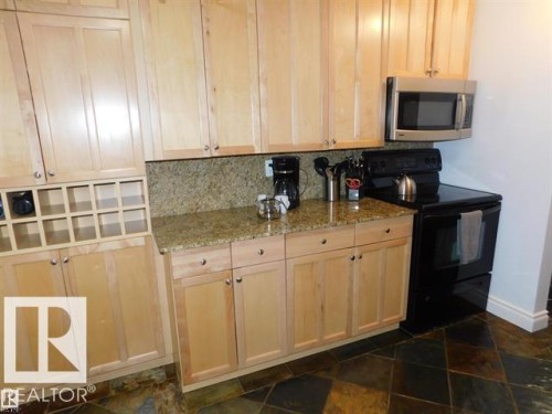 #101 10745 83 Av Nw, Edmonton, AB - Indoor Photo Showing Kitchen