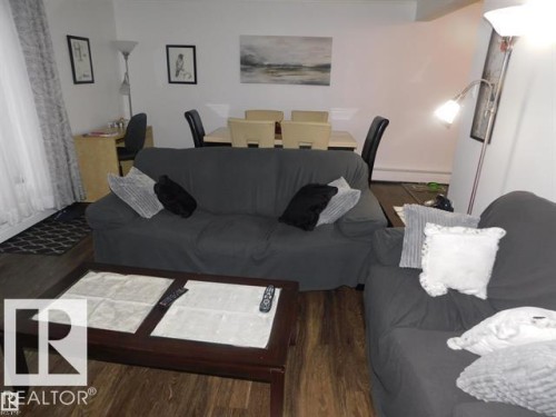 #101 10745 83 Av Nw, Edmonton, AB - Indoor Photo Showing Living Room