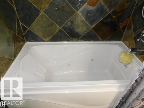 #101 10745 83 Av Nw, Edmonton, AB - Indoor Photo Showing Bathroom
