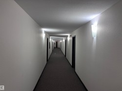 Long corridor with textured white walls - 