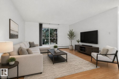 #108 10520 80 Av Nw, Edmonton, AB - Indoor Photo Showing Living Room