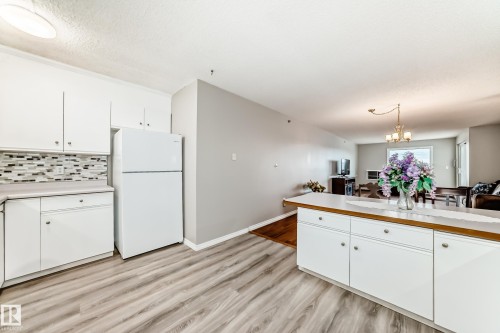311 4906 47 Avenue, Leduc, AB - Indoor Photo Showing Kitchen With Double Sink