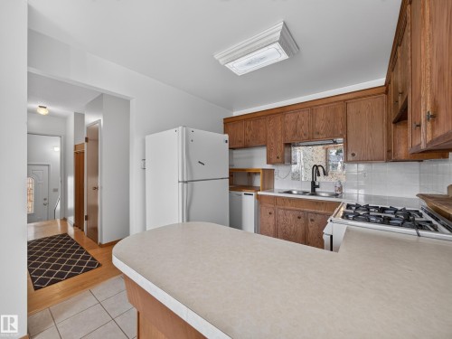 14031 63 Street Nw, Edmonton, AB - Indoor Photo Showing Kitchen With Double Sink