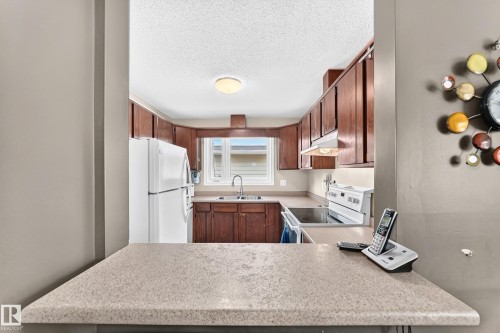 3724 54 Street, Wetaskiwin, AB - Indoor Photo Showing Kitchen With Double Sink
