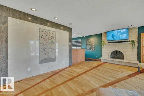 6960 21 Avenue Nw, Edmonton, AB - Indoor Photo Showing Other Room With Fireplace