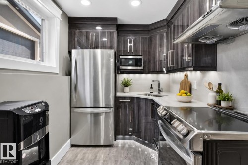 3911 67 Street Nw, Edmonton, AB - Indoor Photo Showing Kitchen With Upgraded Kitchen