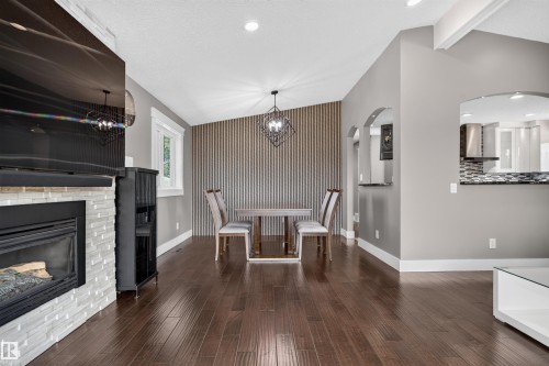 3911 67 Street Nw, Edmonton, AB - Indoor Photo Showing Living Room With Fireplace