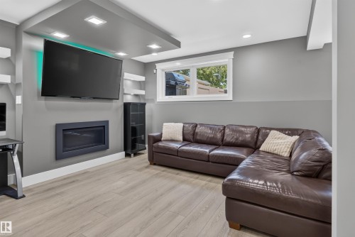 3911 67 Street Nw, Edmonton, AB - Indoor Photo Showing Living Room With Fireplace
