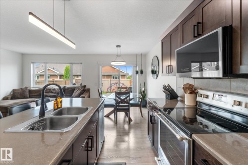 148 Brickyard Place, Stony Plain, AB - Indoor Photo Showing Kitchen With Double Sink