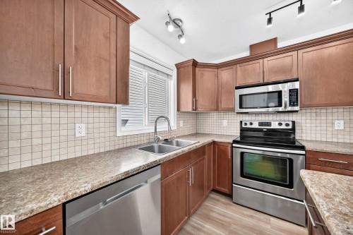 369 Brintnell Boulevard Nw, Edmonton, AB - Indoor Photo Showing Kitchen With Stainless Steel Kitchen With Double Sink