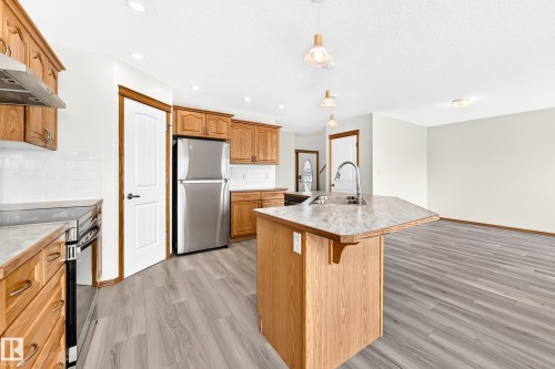 686 Kananaskis Drive, Devon, AB - Indoor Photo Showing Kitchen With Stainless Steel Kitchen With Double Sink