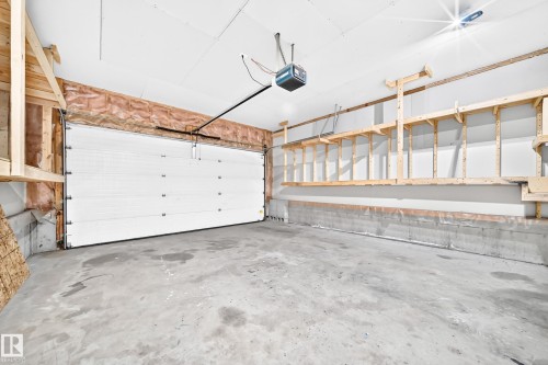686 Kananaskis Drive, Devon, AB - Indoor Photo Showing Garage