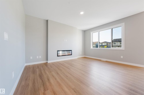 7122 52 Ave Beaumont, Beaumont, AB - Indoor With Fireplace