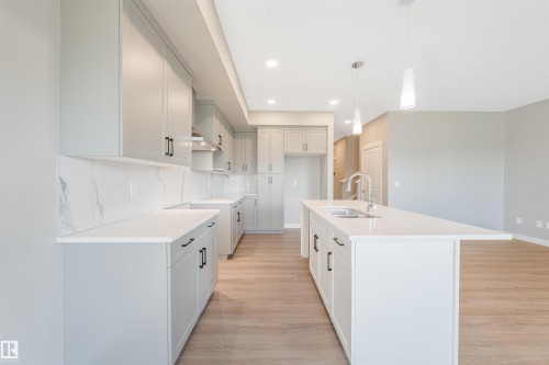 7122 52 Ave Beaumont, Beaumont, AB - Indoor Photo Showing Kitchen With Upgraded Kitchen