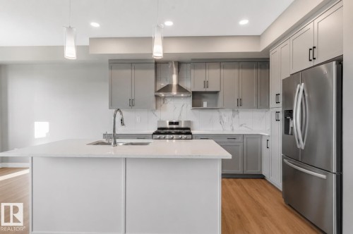7122 52 Ave Beaumont, Beaumont, AB - Indoor Photo Showing Kitchen With Upgraded Kitchen
