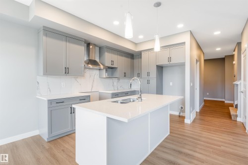 7122 52 Ave Beaumont, Beaumont, AB - Indoor Photo Showing Kitchen With Double Sink